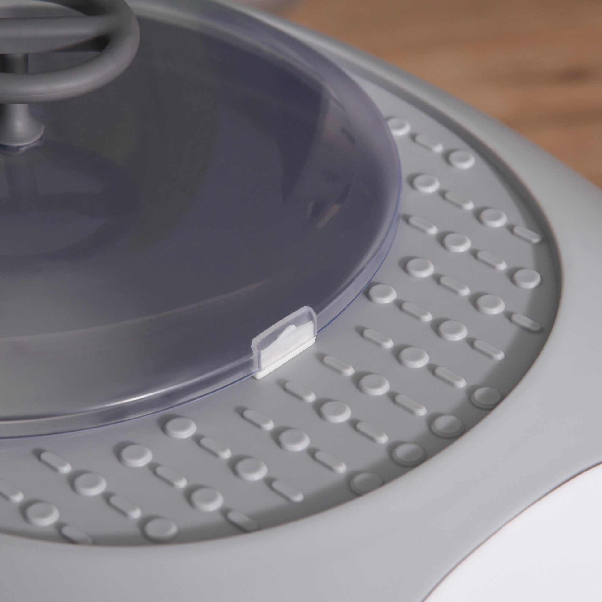 Modern gray cat litter box with lid and clear skylight panel for private pet use