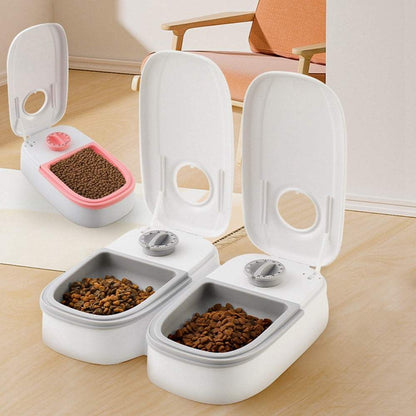 Automatic pet feeder with 2-in-1 gravity food and water dispenser for cats and dogs in pink and gray plastic designs
