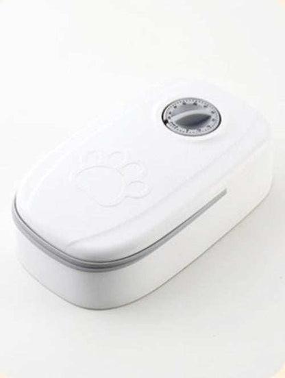 Automatic pet feeder and water dispenser for cats and dogs in pink and gray plastic designs