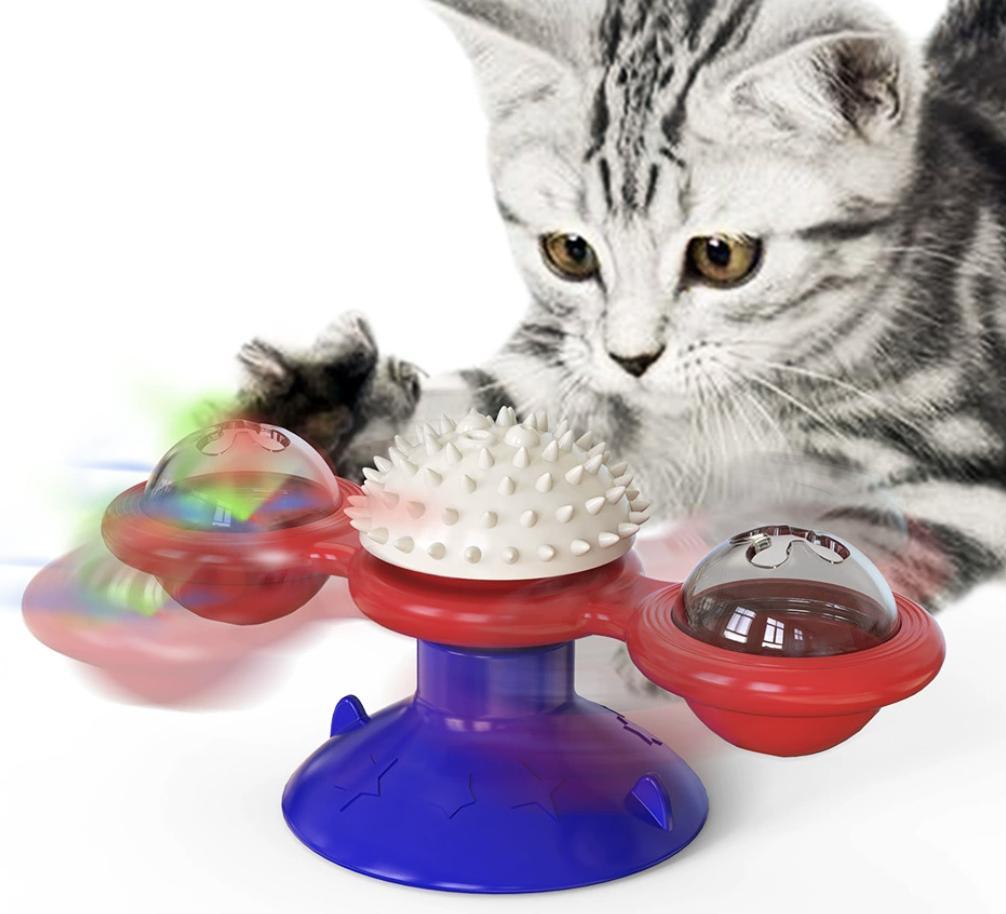Interactive windmill toy with LED light ball and suction cup for indoor cat exercise and entertainment