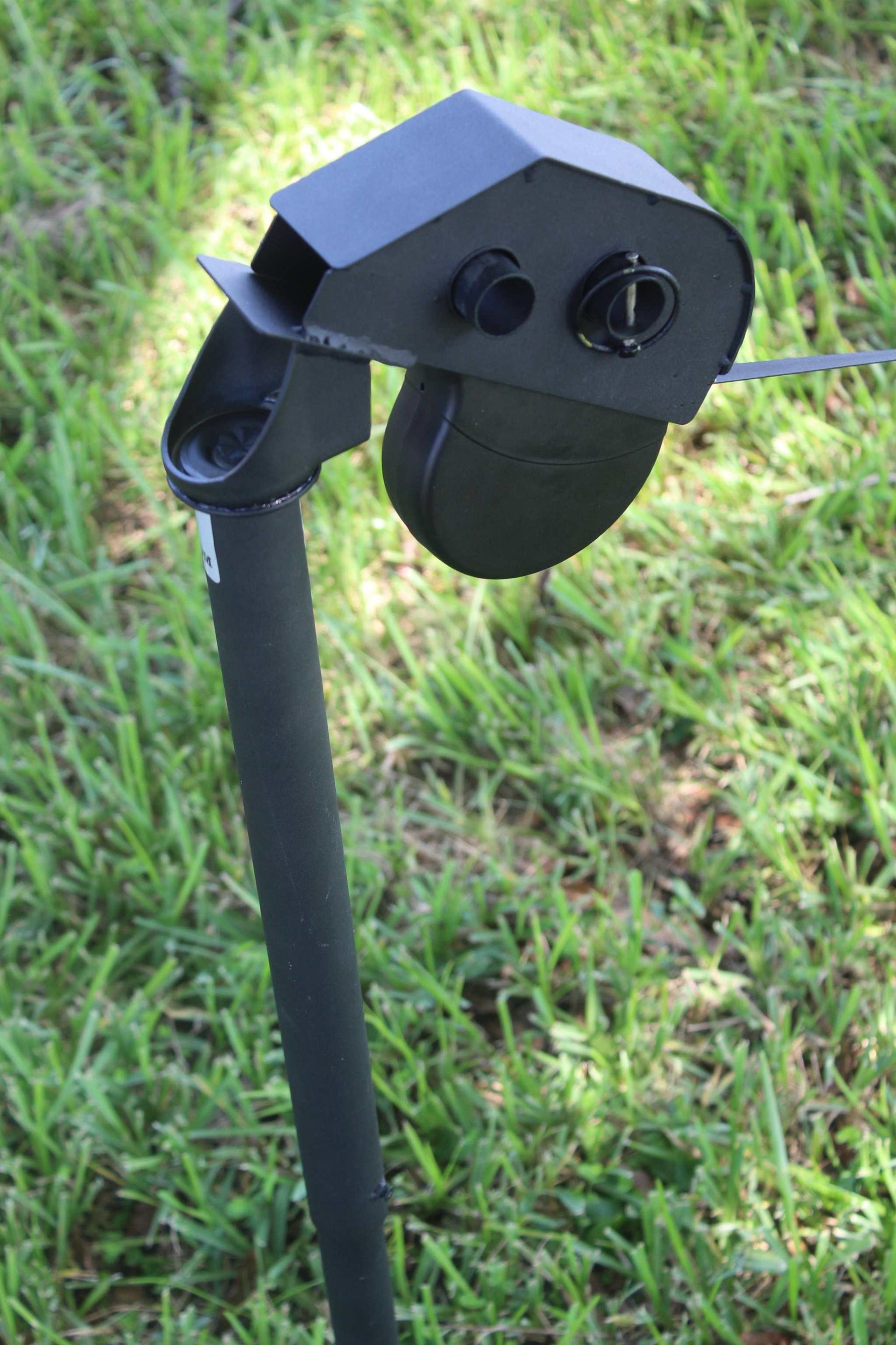 DogKeeper 360-degree swivel pet tether with power-coated steel base for safe outdoor exercise and freedom