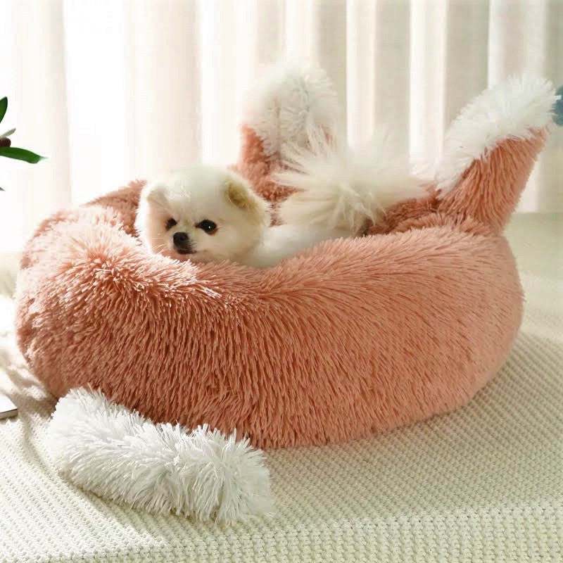 Medium plush pet bed with ears and tail for cats and small dogs, anti-skid bottom, soft faux shag fur, 20-inch diameter, easy to clean, fast 2-day delivery.